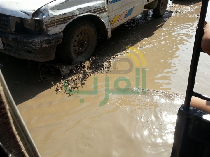 بالصور.. "بولاق الدكرور" غارقة فى "مياه الصرف الصحى".. والأهالى: "مش عارفين نتنفس من الأهمال"